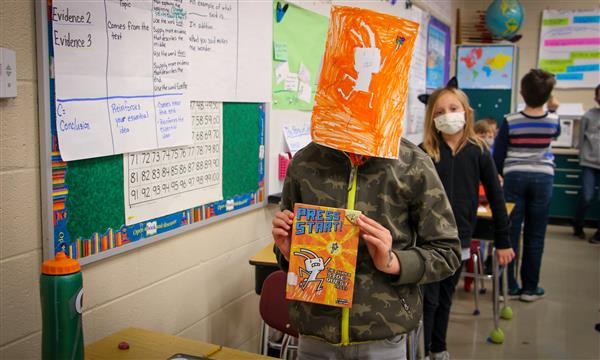 Boy is dressed as a book character